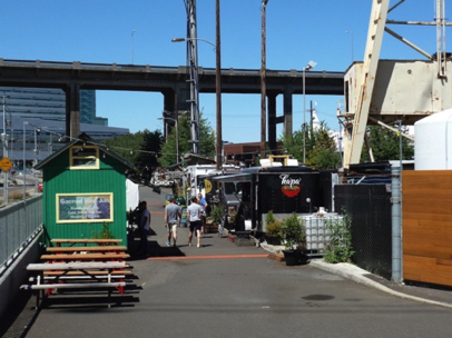 So many options! — food carts at the Tram station — alas, removed for construction...that never occured